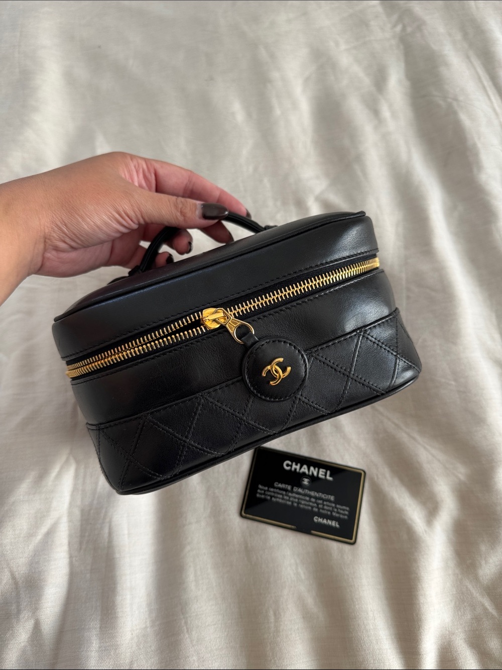 CHANEL Black Quilted Vanity with Gold Hardware